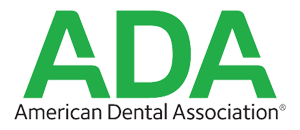 The image shows a logo with the acronym ADA prominently displayed at the top, followed by the letters AMERICAN DANCE ASSOCIATION below it. The logo features a stylized representation of a dancer with one leg raised and the other foot on the ground, with a green outline around the figure.