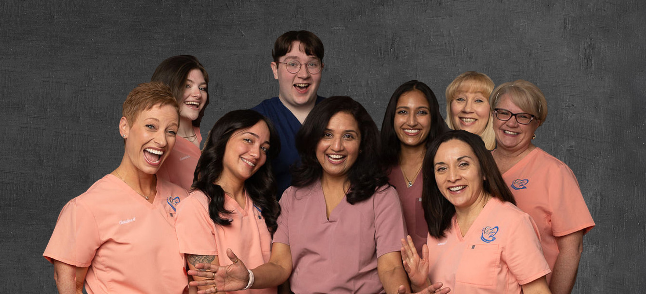 A group of smiling healthcare professionals posing together for a photograph.